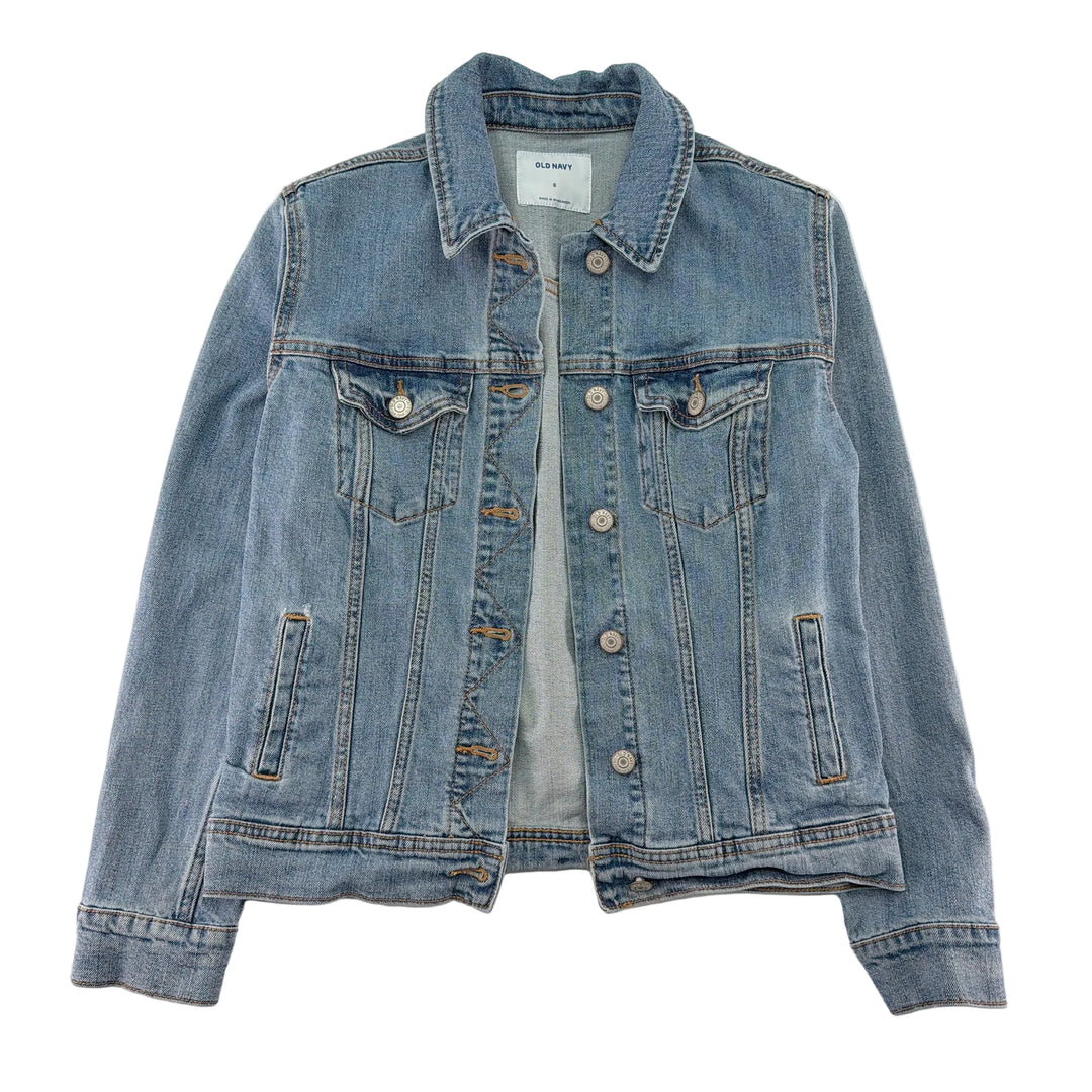 Blue denim jacket on a light gray background