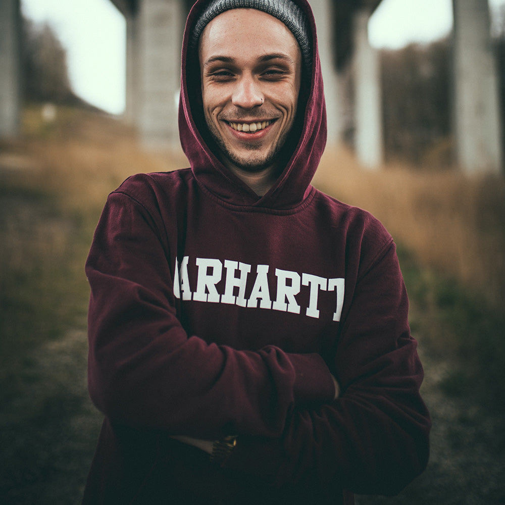 Man wearing Carhartt hoodie